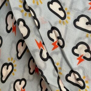 HUGE, soft Anya Hindmarch Cloudy Day Lightning Bolt Scarf with orange fringe